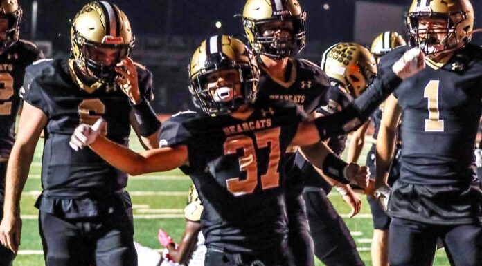 PREP FOOTBALL: Bearcats dominate Columbia 49-0