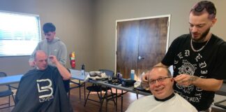 CCSO employees receive free haircuts from local duo