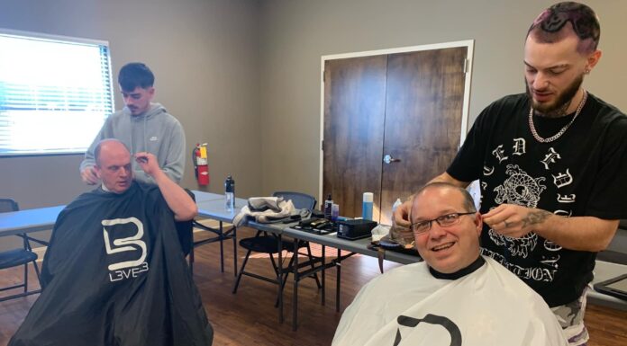CCSO employees receive free haircuts from local duo
