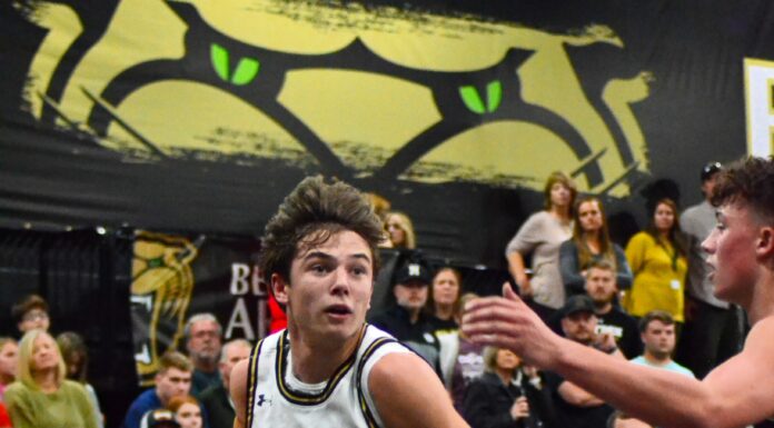 PREP BASKETBALL: Bearcats open season with 85-50 win over Hayden, Lady Broncos earn OT win