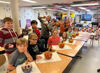 Pumpkin painting to ring in the fall at East Elementary