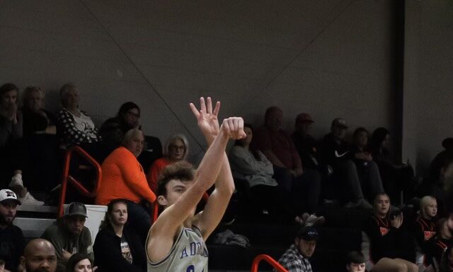 PREP BASKETBALL: Addison splits county matchups at Meek