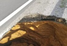 Sinkhole discovered on County Road 222 A large sinkhole was discovered near Exit 305 along County Road 222 on Friday, Jan. 26. The Cullman County Commission said it is confident the roadway remains safe as it is filled. (Jeff Clemons)