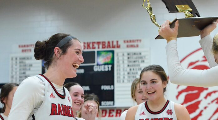 PREP BASKETBALL: Lady Raiders earn area title with 60-55 win over Priceville, Raiders fall to West Morgan 63-59