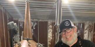 Business spotlight: Alabama Distillery Co. Patrick Watson, AKA Kat Daddy, stands in front of his beloved Shine Still, Big Lucy, at the Alabama Distillery Co. (Cheyenne Sharp)