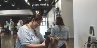 84 kids receive free haircuts, school supplies at Go Platinum Salon event