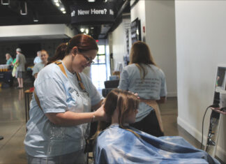 84 kids receive free haircuts, school supplies at Go Platinum Salon event