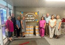 Operation Round Up Board delivers $40K in paper to local schools