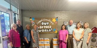 Operation Round Up Board delivers $40K in paper to local schools