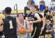 PREP BASKETBALL: Broncos, Lady Broncos collect wins over Cleveland