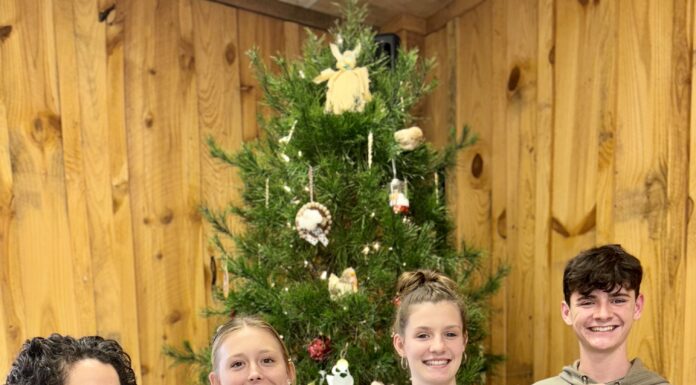 Heritage Homeschool participants try their hands at punch needle embroidery