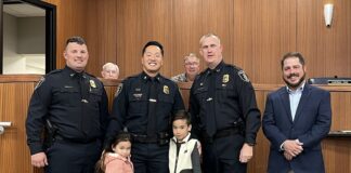 Cullman City Council, CPD announce promotions, new patrol major Intae Suh was promoted to major of investigation. Left to right are Assistant Chief Brandon Patterson, Taisley Suh, Major Intae Suh, Torrin Suh, Chief Joey Duncan and Councilman Brad Smith. (W.C. Mann for The Cullman Tribune)