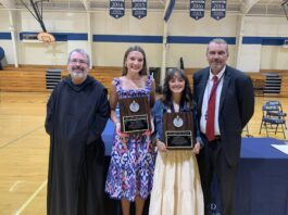 Saint Bernard’s McBride, Kerber win Fr. Luke Fazi Award Fr. Linus Kluscarits, school chaplain; Abigail McBride; Madilyn Kerber; and Tim Burleson, athletic director (Saint Bernard Prep)