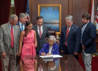 Ivey signs LuLu’s Law, enabling shark alert system for coastal counties