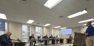 Commission approves airport bids, voting precinct change