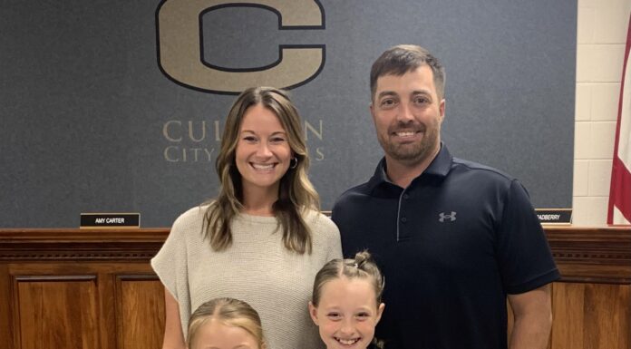 PREP SOFTBALL: ‘This is where I feel like God led me’: Drew Bryson returning to Cullman to lead Bearcats softball team Samantha Bryson and Drew Bryson with their daughters Hadley and Bryleigh at the Wednesday, May 21, 2025, Cullman City School Board meeting (Nick Griffin)