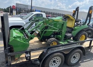2 men arrested following tractor, trailer theft This stolen trailer and John Deere tractor were recovered in the parking lot of the north Cullman Walmart on June 25, 2025. (Cullman Police Department)
