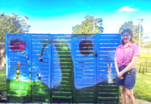 Eliana Hollis creates East Elementary garden mural