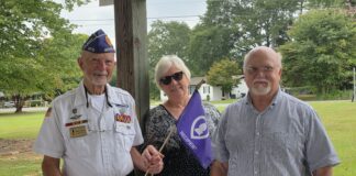 Families, friends gather to honor local heroes at Purple Heart memorial service
