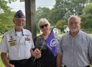 Families, friends gather to honor local heroes at Purple Heart memorial service