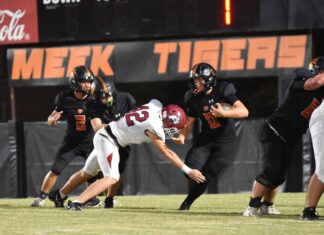 PREP FOOTBALL: Meek dominates region matchup with Phillips 60-6