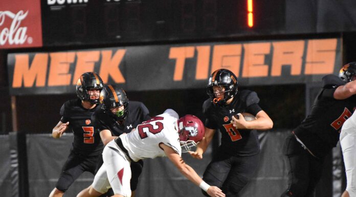 PREP FOOTBALL: Meek dominates region matchup with Phillips 60-6