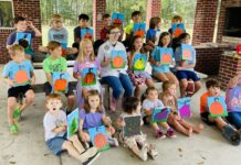 Homeschool students enjoy fall book reading
