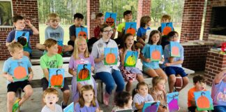 Homeschool students enjoy fall book reading