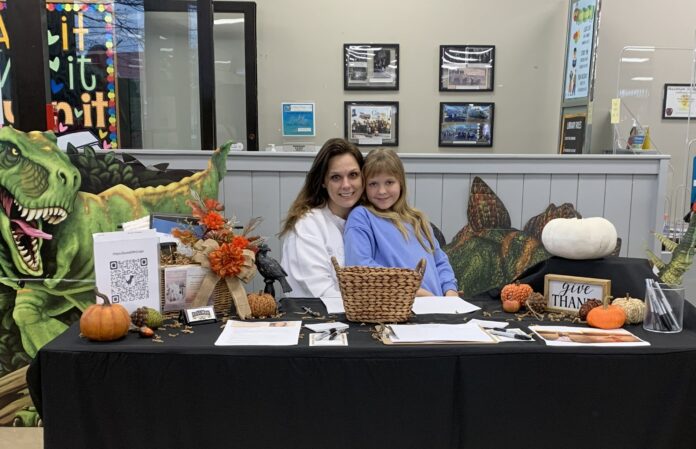 90CB2DD7-417B-44DB-AA2C-567F8151963E Brittany Hamm and her daughter, Bella Hamm, at the Cullman County Public Library in downtown Cullman on Nov. 20, 2025 (Chasady Woods/ The Cullman Tribune)
