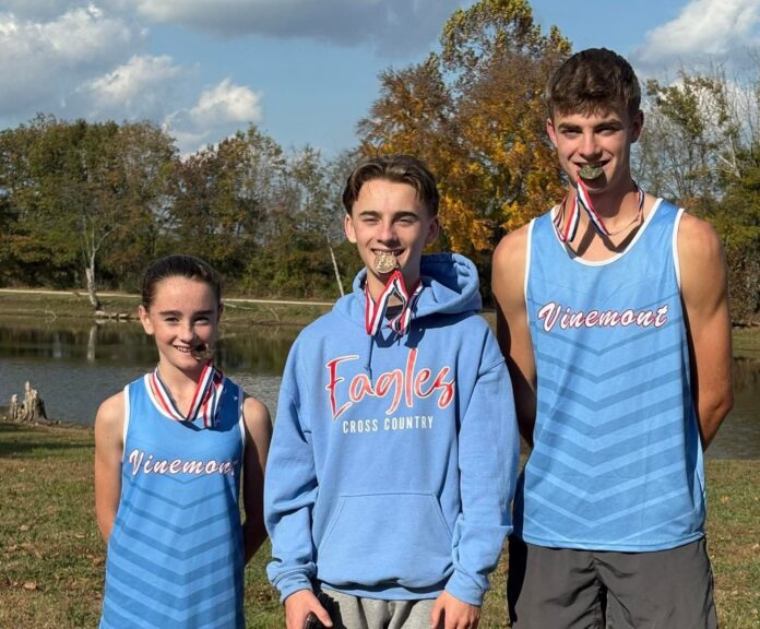 Vinemont High School’s Cross Country team made school history at the 2025 AHSAA 3A State Championship Nov. 8, bringing home multiple All-State honors and record-breaking performances. Left to right are Aurellia Powell, Anakin Powell and Brady Johnson. (April Powell)