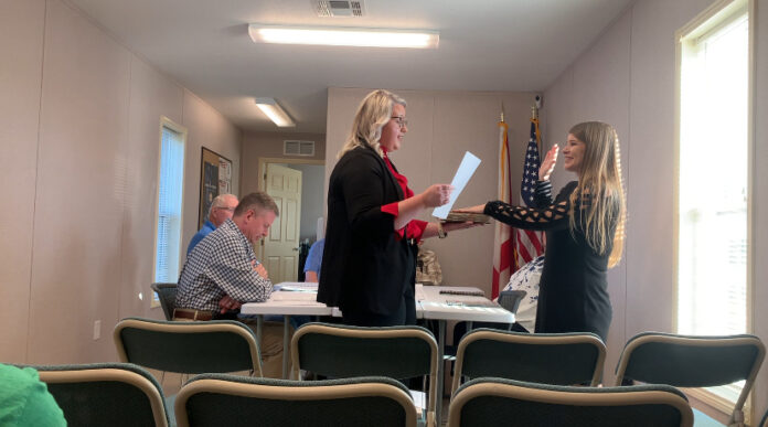 Vinemont Town Clerk Kayecea Sasser, left, swears in Berlin Town Clerk Keirstyn Montgomery on Monday, Nov. 3, 2025. (Chasady Woods/The Cullman Tribune)