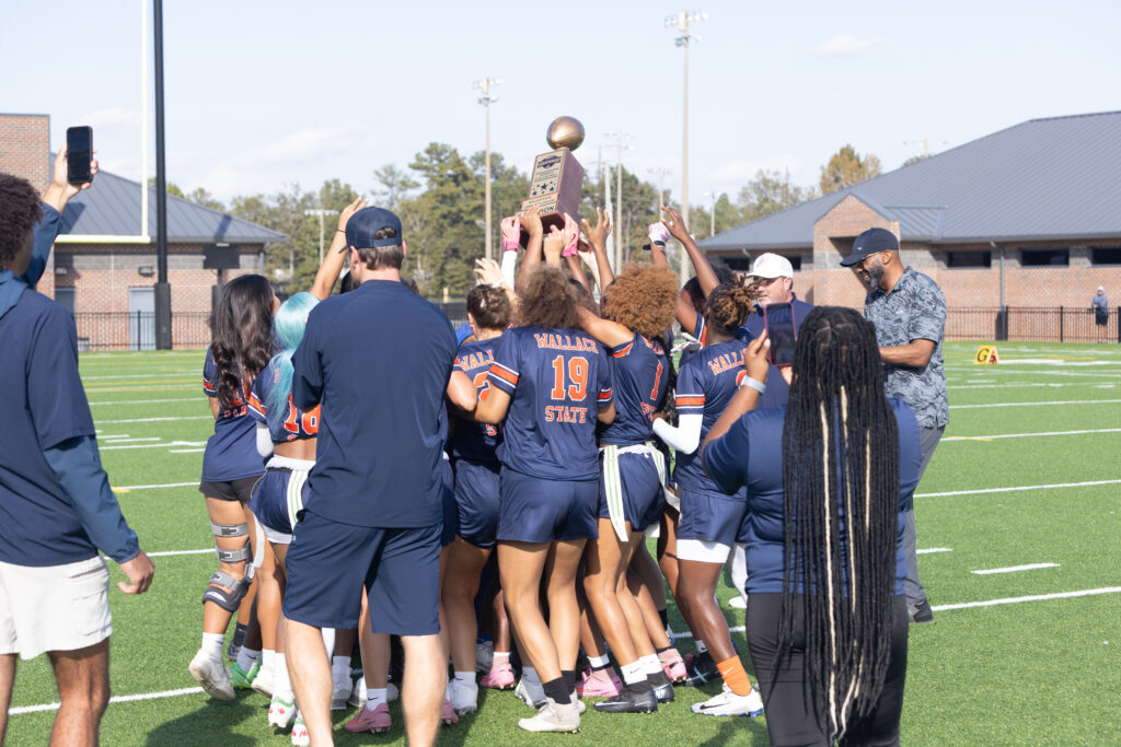 A dream that began less than a year ago became reality on Sunday, Nov. 16, 2025, as Wallace State flag football captured the inaugural ACCC Flag Football Championship with a commanding 27–6 win over Shelton State at Rip Hewes Stadium. The top-seeded Lions closed out their first-ever season with a flawless 20-0 record. (Wallace State Sports Information)