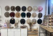 SMALL BUSINESS SPOTLIGHT: Split Tree Designs Hat Bar Wall of hats by Split Tree Designs Hat Bar (Anabelle Howze/The Cullman Tribune)