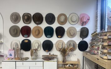 SMALL BUSINESS SPOTLIGHT: Split Tree Designs Hat Bar Wall of hats by Split Tree Designs Hat Bar (Anabelle Howze/The Cullman Tribune)