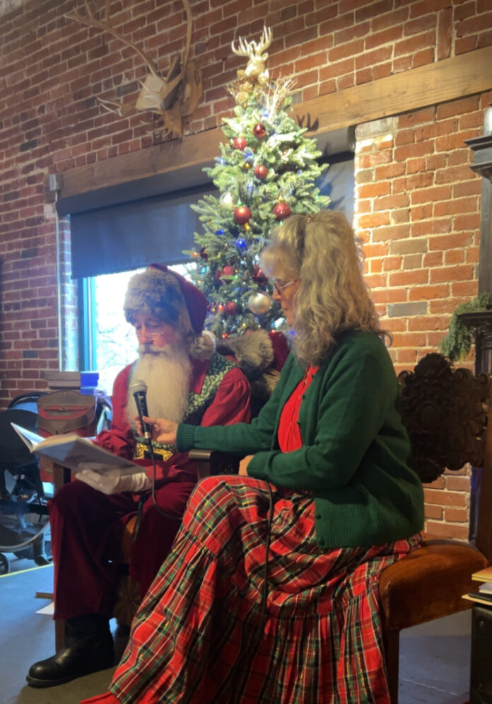 3 Santa reads “The Christmas Story” at Karma’s Coffee House on Sunday, Dec. 7, 2025. (Anabelle Howze/The Cullman Tribune)