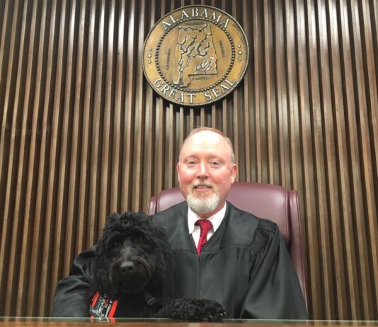 Judge Greg Nicholas retiring Cullman County Circuit Court Judge Greg Nicholas and courthouse facility dog Brooksie (Cullman Tribune file photo)