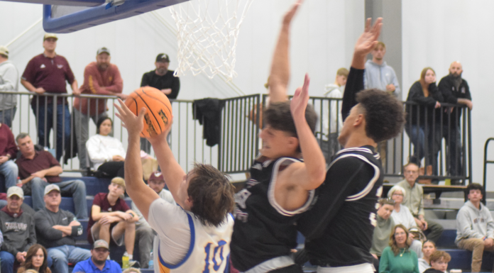 PREP BASKETBALL: Lady Warriors, Eagles collect county wins