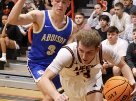 PREP BASKETBALL: Meek grinds out a 56-53 overtime win over rival Addison