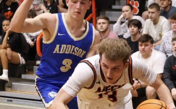 PREP BASKETBALL: Meek grinds out a 56-53 overtime win over rival Addison