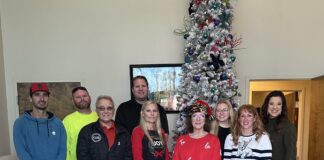 City of Good Hope thanks Nexan Building Products for longtime Christmas sponsorship Pictured left to right are Crystal Carpenter, Christy Gowens, Christie Burrow, Courtney Beck, Cyndi Booth, Mayor Jerry Bartlet, Corey Harbison, Daniel Brasher and Blake Malin. (City of Good Hope)