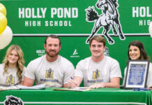 Holly Pond’s Allbright signs with Murray State Left to right are Lilly Allbright, Heath Allbright, Cade Allbright and BreAnn Allbright. (Katie Drummond/The Cullman Tribune)