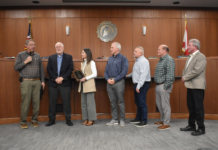 Cullman City Council recognizes service of outgoing CEDA Director Dale Greer, salutes achievements of others Mayor Woody Jacobs, left, and the Cullman City Council (including, left to right, Kim Hall, David Moss, Chuck Shikle, Paul Schaffer and Jason Willoughby) recognized the service of Cullman Economic Development Agency Director Dale Greer, second from left, at the Monday, Jan. 12, 2026, Cullman City Council meeting. (W.C. Mann/The Cullman Tribune)