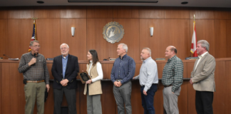 Cullman City Council recognizes service of outgoing CEDA Director Dale Greer, salutes achievements of others Mayor Woody Jacobs, left, and the Cullman City Council (including, left to right, Kim Hall, David Moss, Chuck Shikle, Paul Schaffer and Jason Willoughby) recognized the service of Cullman Economic Development Agency Director Dale Greer, second from left, at the Monday, Jan. 12, 2026, Cullman City Council meeting. (W.C. Mann/The Cullman Tribune)