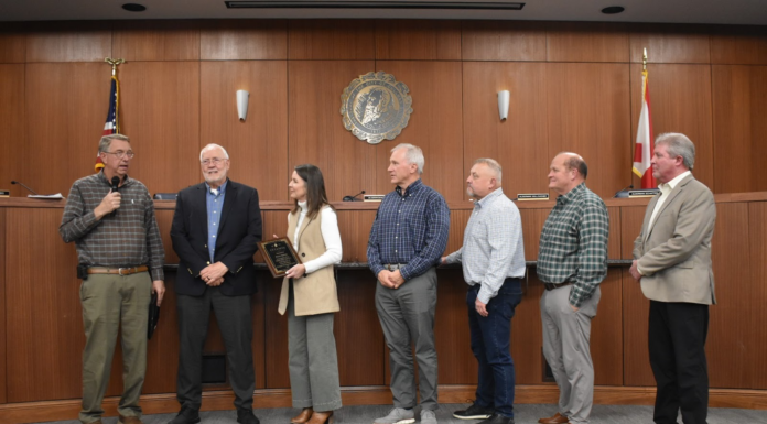 Cullman City Council recognizes service of outgoing CEDA Director Dale Greer, salutes achievements of others Mayor Woody Jacobs, left, and the Cullman City Council (including, left to right, Kim Hall, David Moss, Chuck Shikle, Paul Schaffer and Jason Willoughby) recognized the service of Cullman Economic Development Agency Director Dale Greer, second from left, at the Monday, Jan. 12, 2026, Cullman City Council meeting. (W.C. Mann/The Cullman Tribune)
