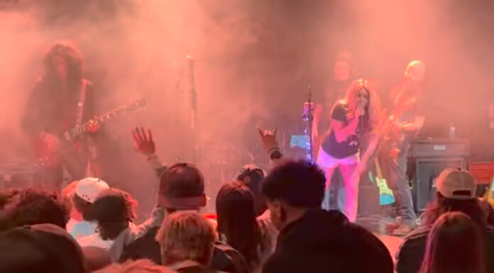 Local band Raine performs at scholars bowl fundraiser