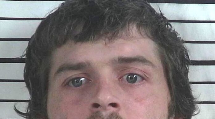 Suspect apprehended after burglary, chase; 16 stolen firearms recovered