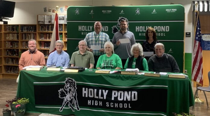 Holly Pond distributes funds to area schools