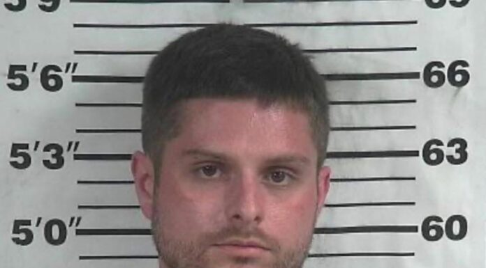 Vehicle break-ins reported at Hwy. 157 businesses; Joppa man charged