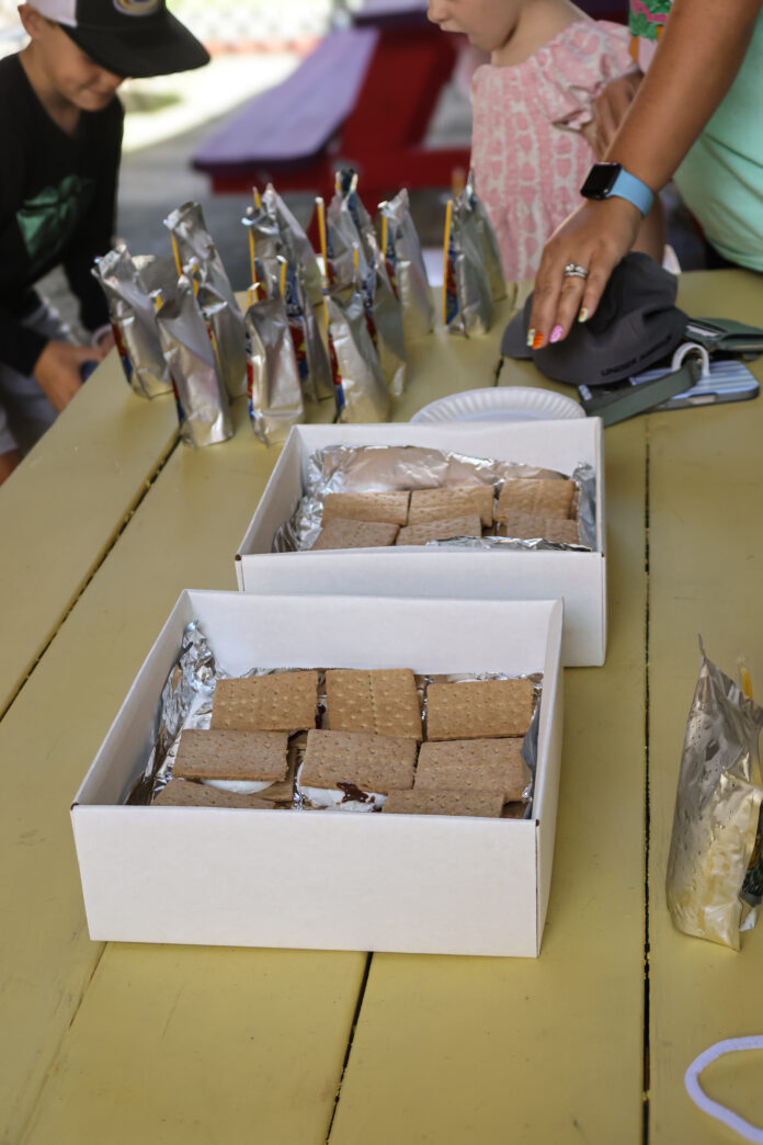 5) Gilmore and Robers cooked s'mores using solar power oven box